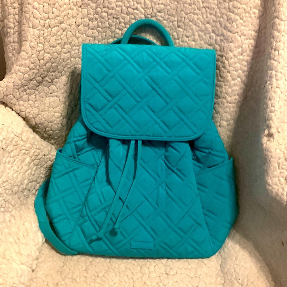 Vera Bradley quilted backpack. Drawstring and magnetic clasp. Floral lining.